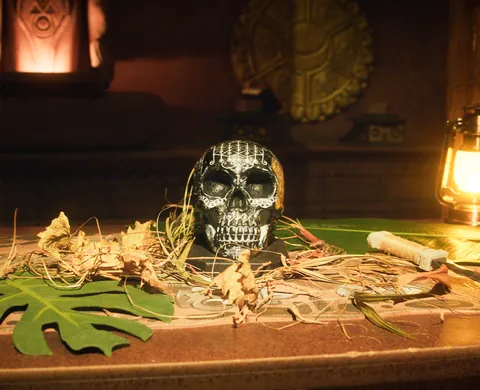 The ornate skull on the temple altar by lantern light